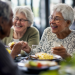 Some elderly women dine together, enjoying one another's company